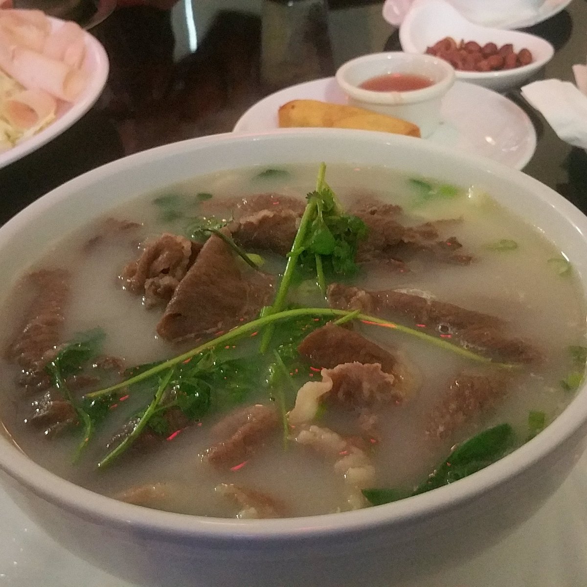 Sichuan Hot Pot & Asian Cuisine signature dishes Sichuan Hot Pot, Mapo Tofu, Cumin Lamb, Dry-Fried Chicken